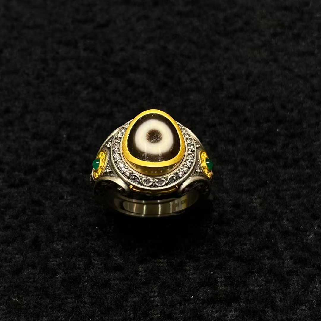 Handcrafted Tibetan Buddhist Golden Wheel ring made of S925 silver with fine inlay and oily patina.