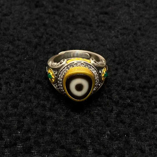 S925 sterling silver Dharma Wheel ring featuring detailed Tibetan Buddhist craftsmanship and smooth patina.