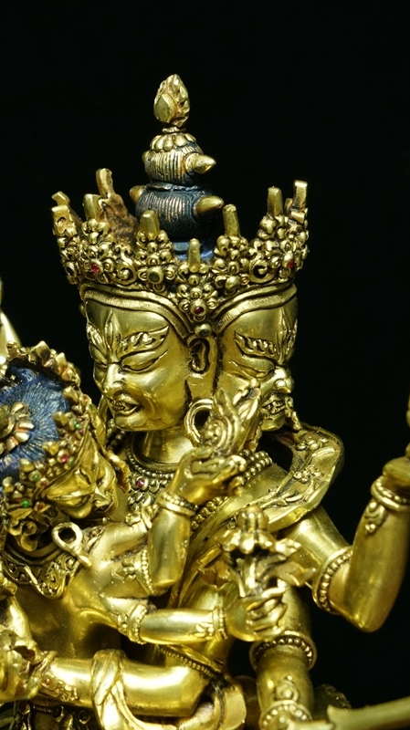 Alt Text: "Tibetan Buddhist Dense Vajra Buddha Statue, handcrafted and gilded with gold, a traditional piece of Buddhist art representing strength and protection."