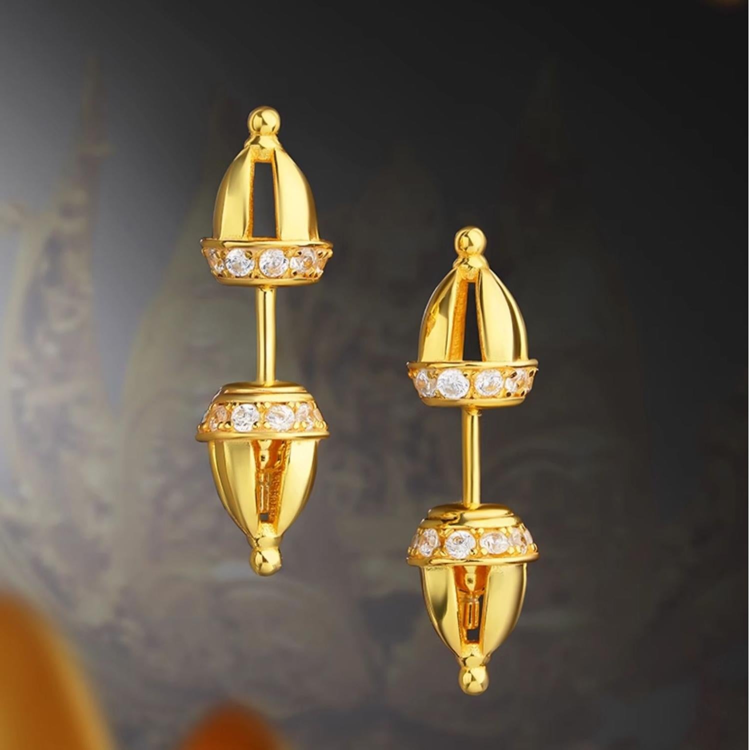 Artisan Tibetan Buddhist Vajra earrings in sterling silver, representing strength and spiritual awakening.