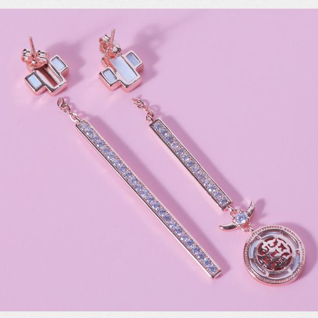 Exquisite dragon-themed earrings crafted from alloy, mother of pearl, and cubic zirconia for spiritual harmony.