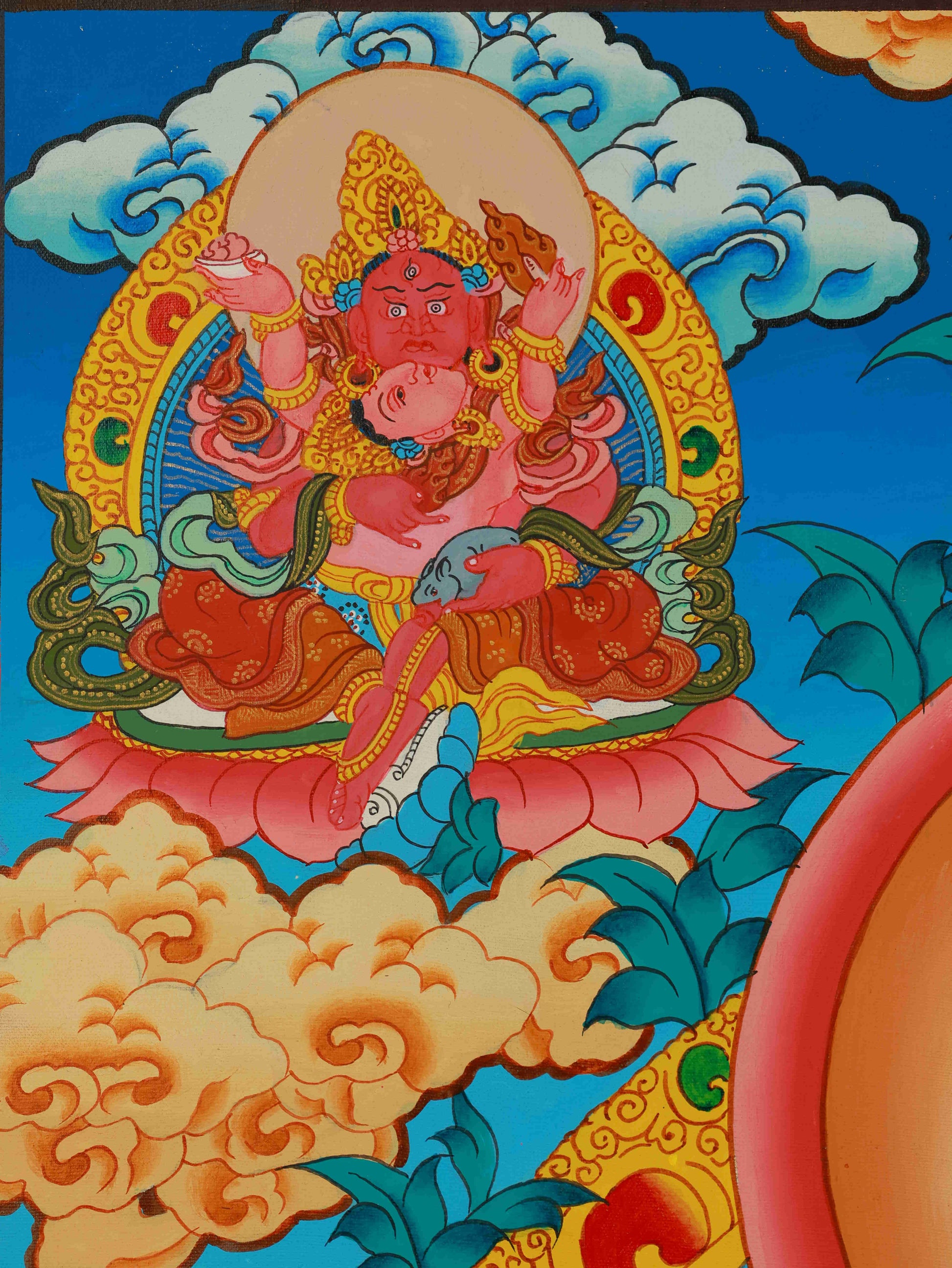 Handcrafted Yellow Jambhala Thangka painting, Tibetan Buddhist artwork representing wealth and prosperity.