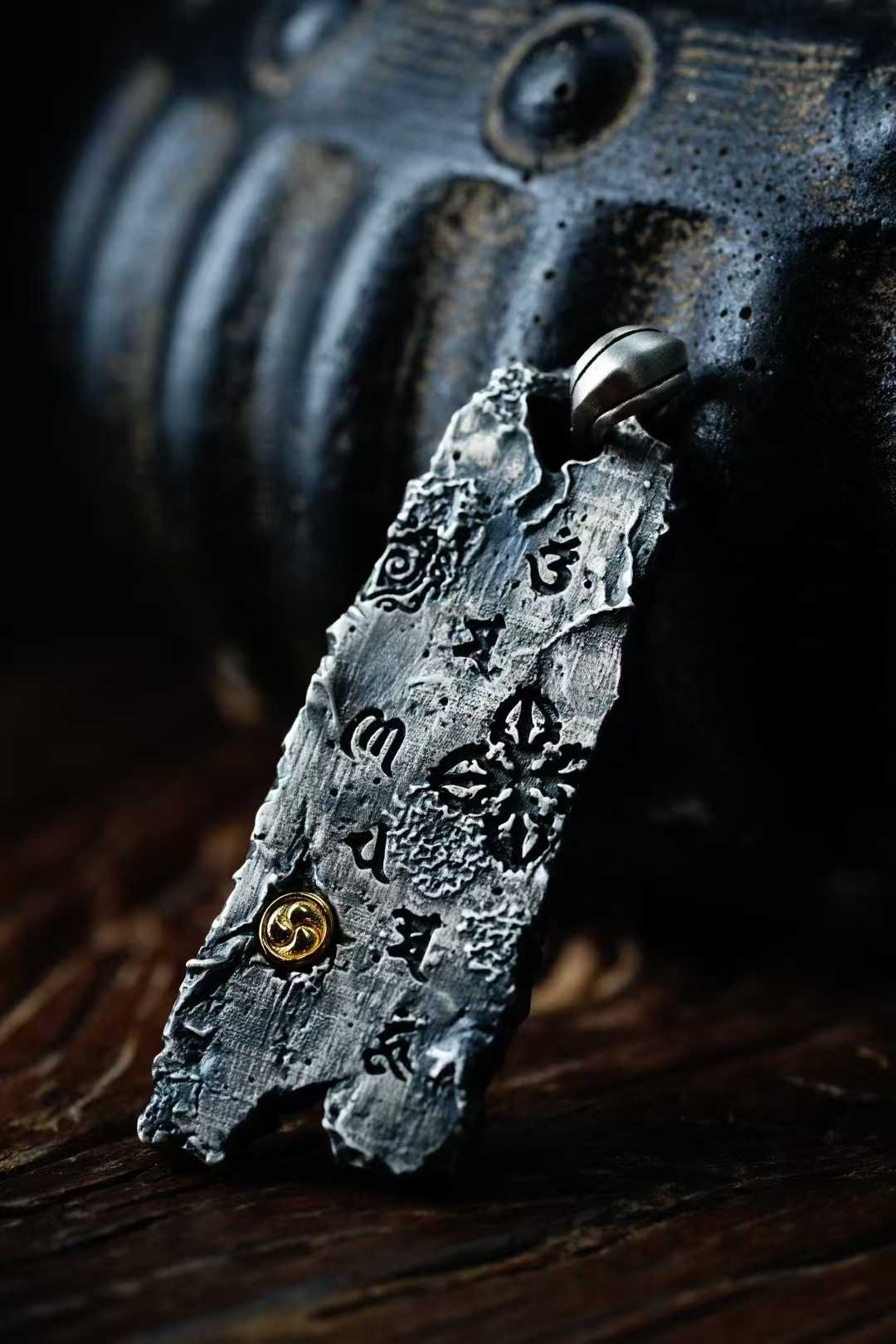 Handmade Tibetan Eight Treasures amulet pendant with artisan metalwork