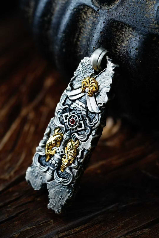 Handcrafted Tibetan Buddhist pendant featuring the Eight Auspicious Symbols
