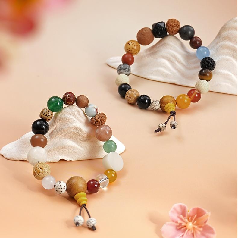 Handcrafted Tibetan-Buddhist Eighteen Beads bracelet with Bodhi seeds and diverse stones for spiritual wear.