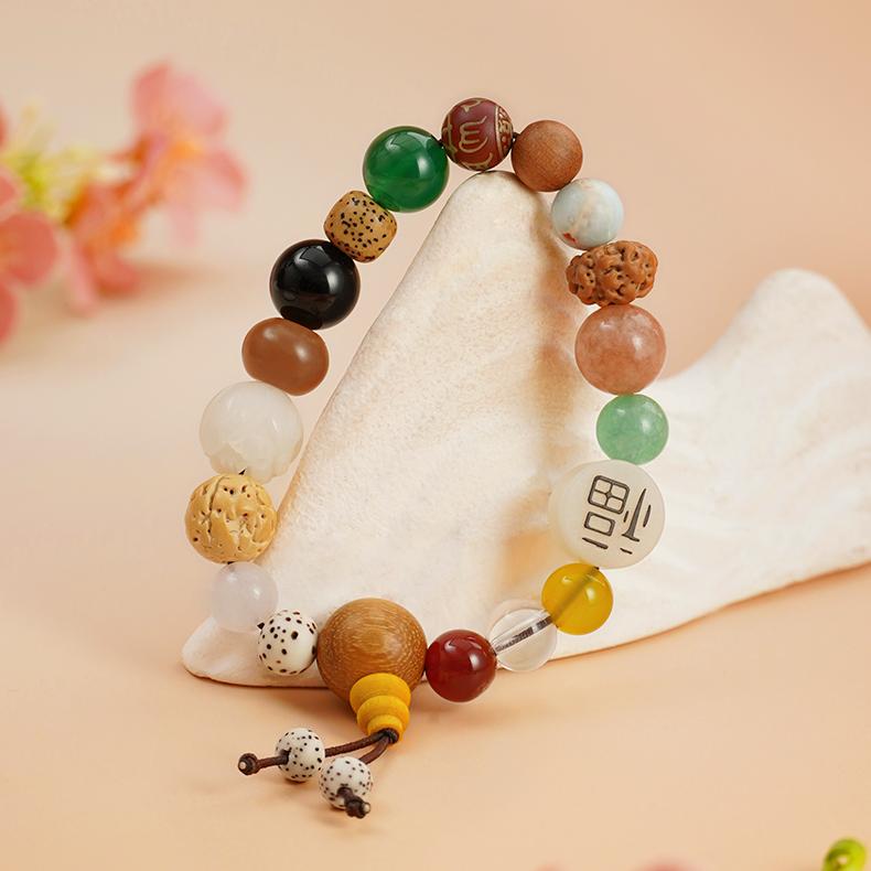 Handmade Tibetan-Buddhist Eighteen Beads bracelet with Bodhi seeds, incense-ash mantra bead, and mixed gemstones.