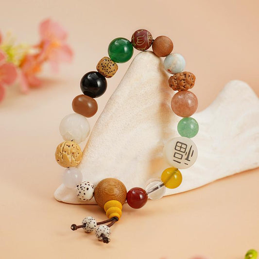 Handmade Tibetan-Buddhist Eighteen Beads bracelet with Bodhi seeds, incense-ash mantra bead, and mixed gemstones.