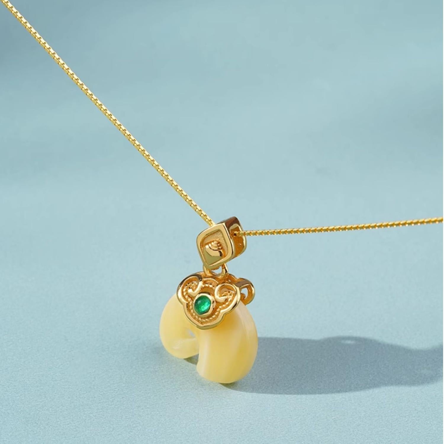 Tibetan Buddhist Intuition and Wisdom Pendant made from Amber and Silver