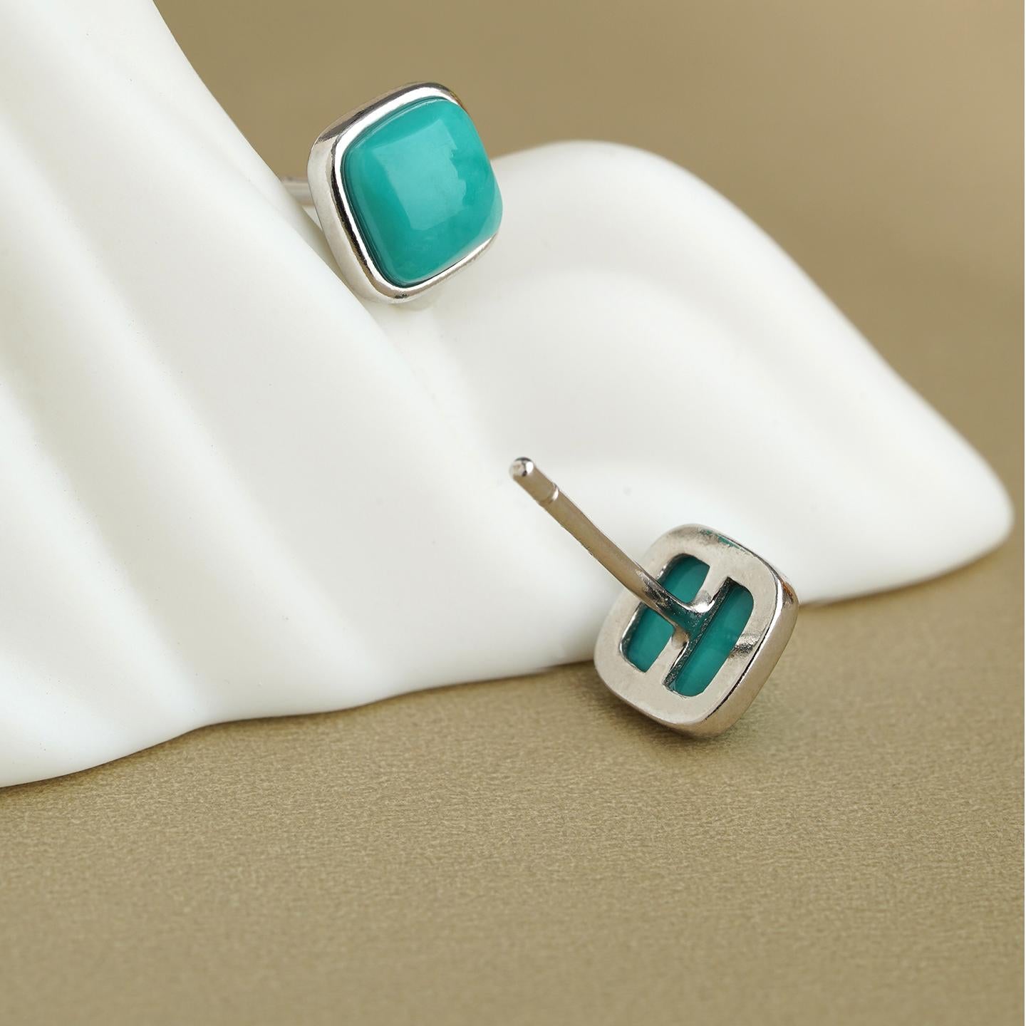 Elegant Tibetan-Buddhist turquoise silver earrings inspired by Tibetan Buddha aesthetics, handmade with sacred artistry.