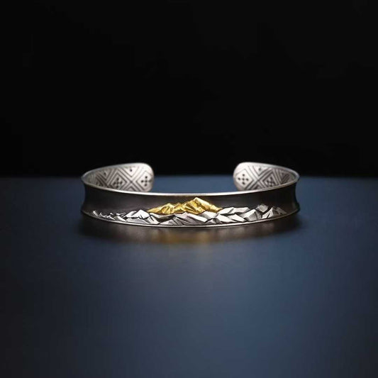 Handcrafted Tibetan Buddhist Everest bracelet made of pure gold and silver with fine inlay craftsmanship.