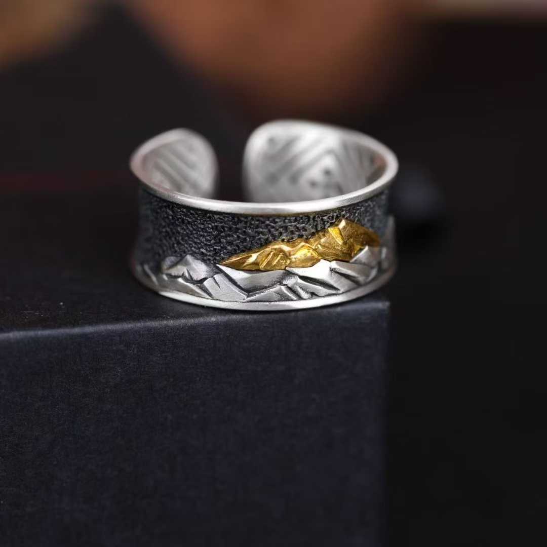 Tibetan Buddhist Everest ring, handcrafted with gold and silver inlay, sacred jewelry.