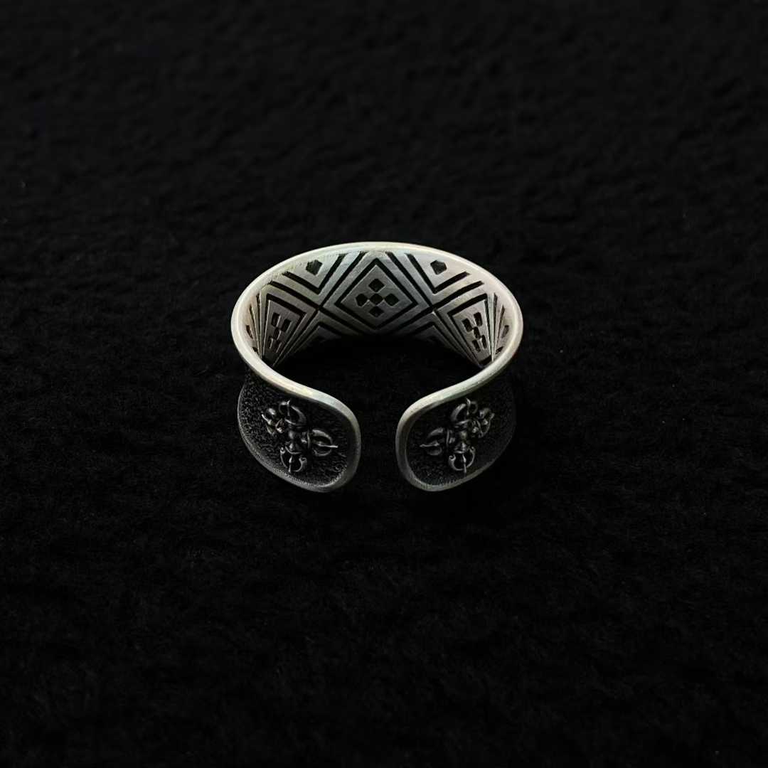 Handmade Everest ring, gold and silver inlay with sacred Tibetan Buddhist design.