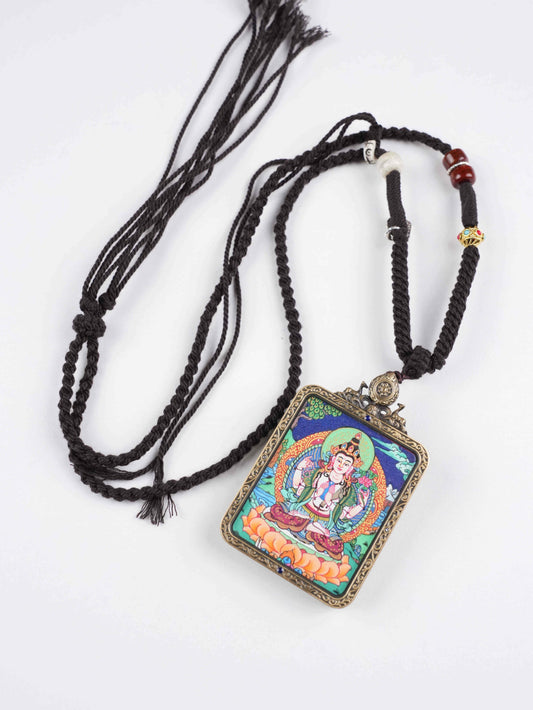 Tibetan Buddhist Four-Armed Avalokiteshvara thangka pendant, hand-painted on traditional thangka canvas with mineral pigments, symbolizing compassion and zodiac protection.