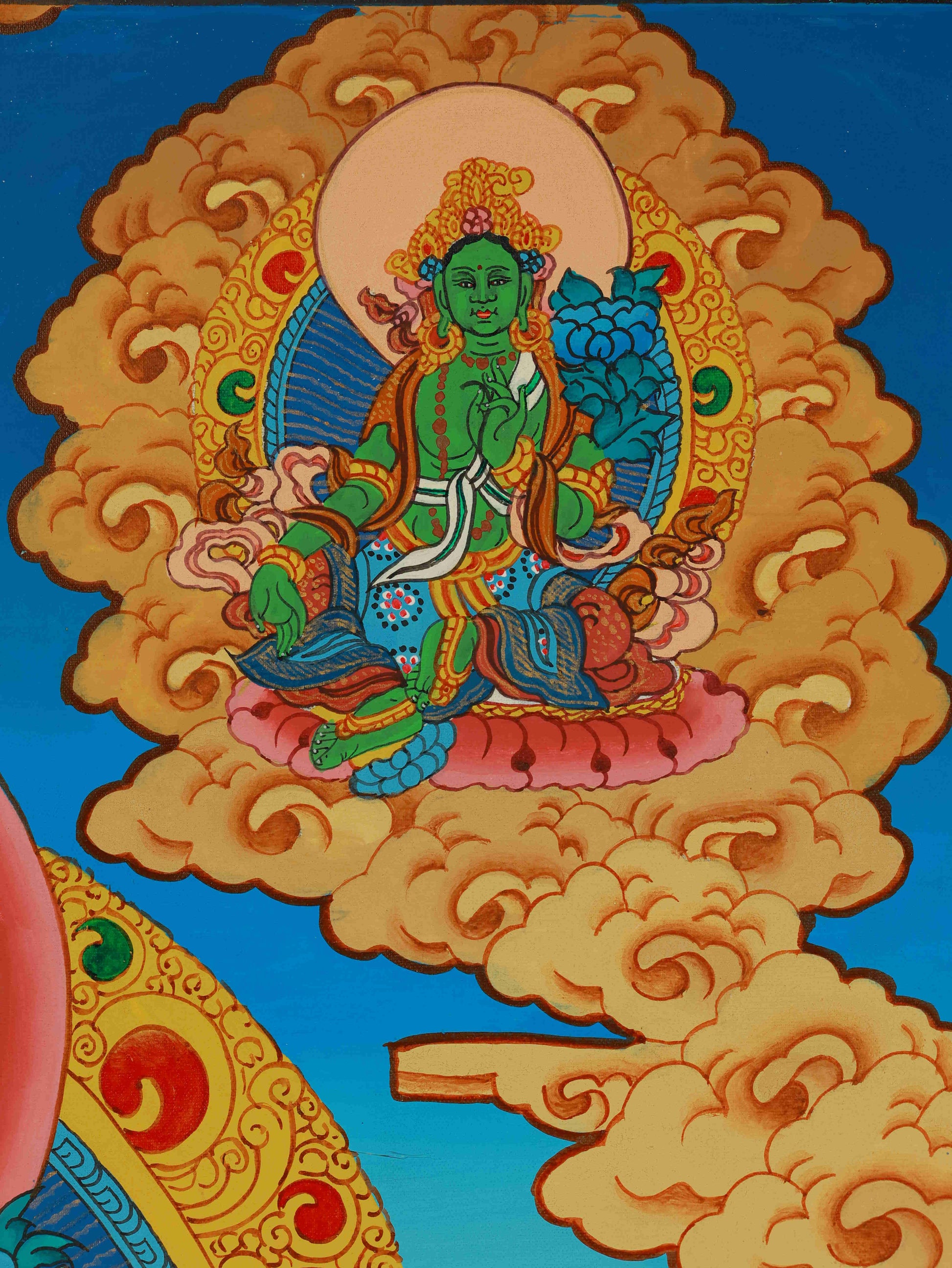 Close-up of Four-Armed Avalokiteshvara Thangka, highlighting exquisite hand-painted details and mineral pigments.