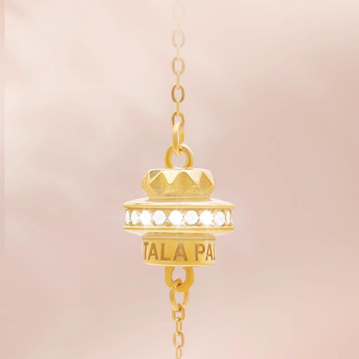 "Handcrafted Tibetan Buddhist Fu Lai Yun Zhuan earrings, featuring 18K gold and zircon for spiritual prosperity and good fortune."