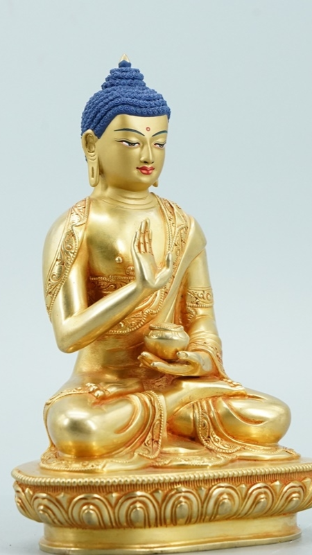 Five Buddha statues handcrafted with gilded details and mineral paint, representing the spiritual elegance and meticulous artistry of Tibetan Buddhism.