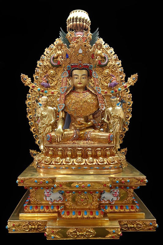Tibetan Buddhist Jowo Buddha sculpture in golden gilded brass, representing enlightenment, prosperity, and protection in sacred spaces.