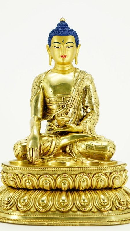 Gilded Shakyamuni Buddha statue art in Tibetan Buddhist style, handmade with mineral pigments