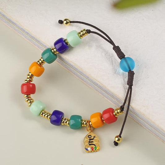 Tibetan-Buddhist “Jin Lan Xue Ba” handmade glass Sherpa bracelet with copper charm
