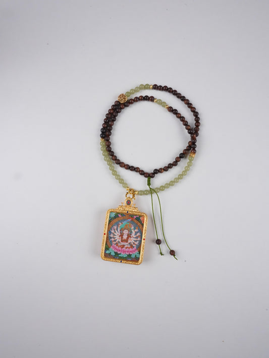 Tibetan Buddhist Green Tara Thangka Painting, hand-painted with natural mineral pigments on traditional cotton canvas. A sacred artwork for meditation, compassion, and spiritual protection.