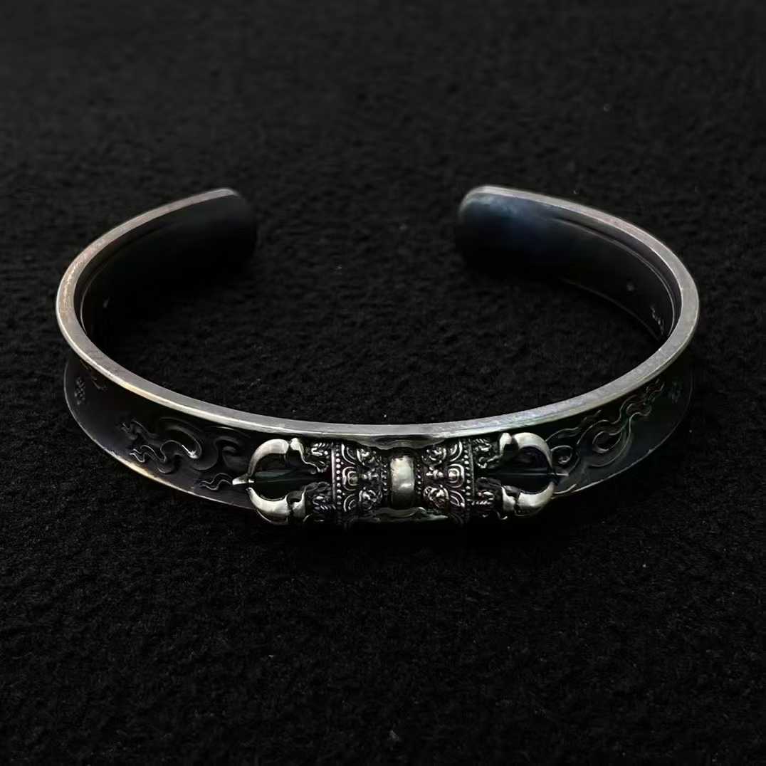 Handcrafted Tibetan Buddhist Vajra bangle made from pure gold and silver with fine inlay craftsmanship.