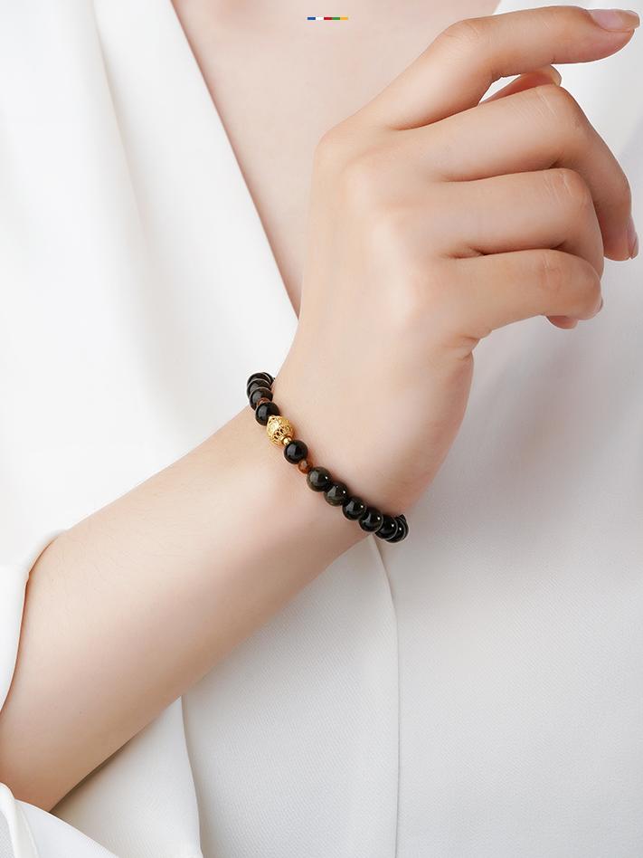 Yeminghui handcrafted Golden Obsidian and crystal bracelet with fine 925 silver bead accents

