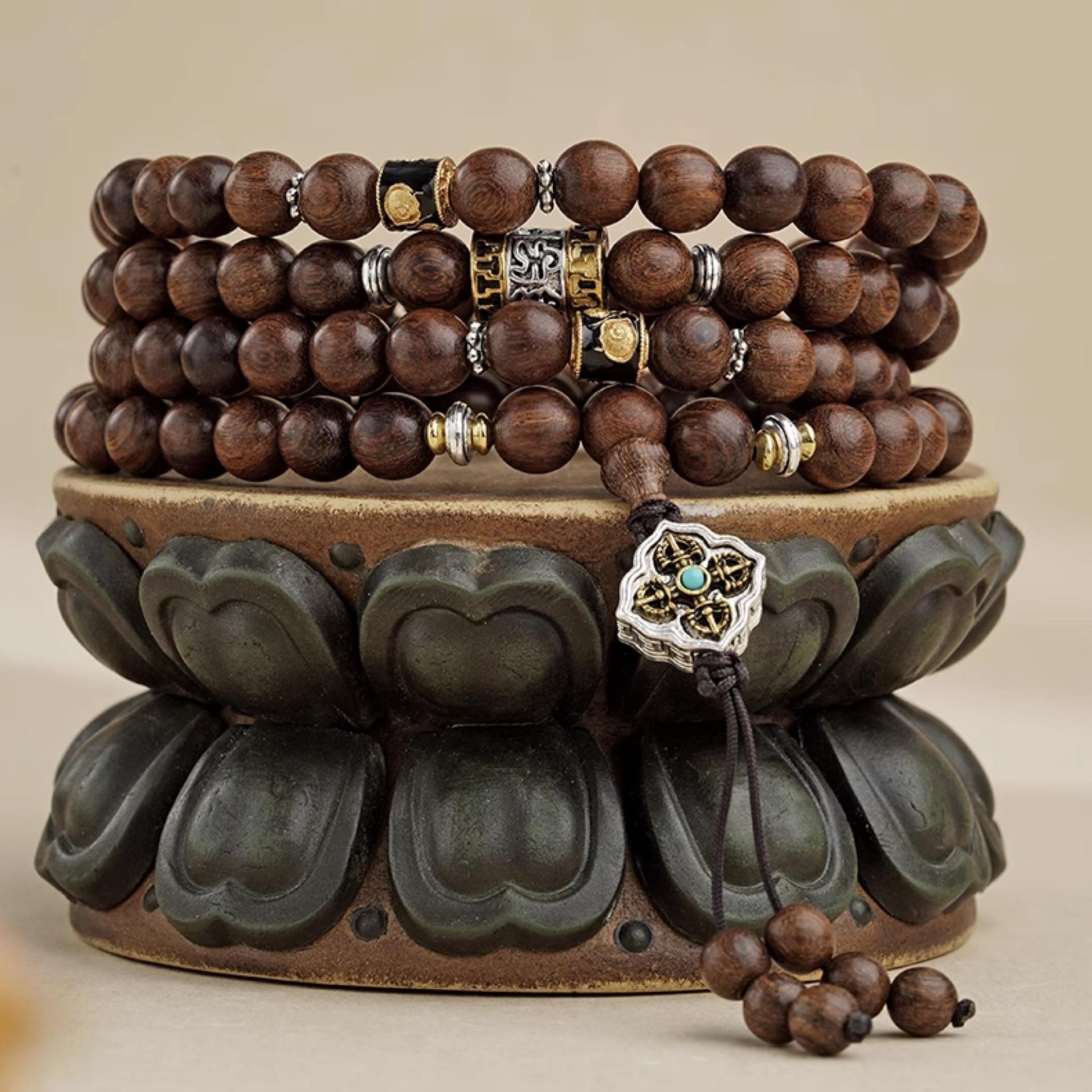 Golden sandalwood prayer mala with copper beads, handmade in Tibetan Buddhist jewelry tradition.