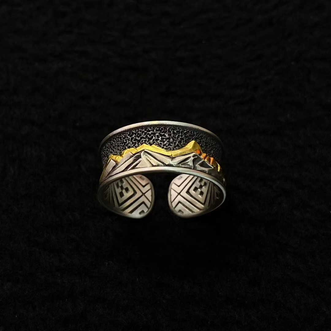 Tibetan Buddhist Gongga Snow Mountain ring, handcrafted with gold and silver inlay, sacred jewelry.