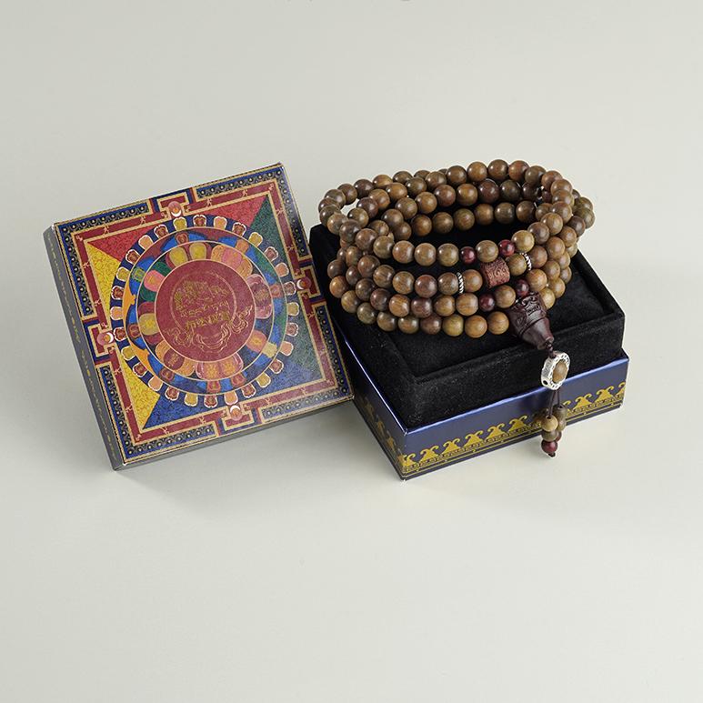 Pure handmade sandalwood mala bracelet with Tibetan-inspired wooden bead arrangement.