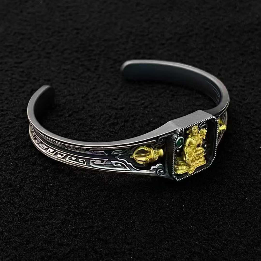 Artisan-made Green Tara bangle with detailed silver inlay craftsmanship.