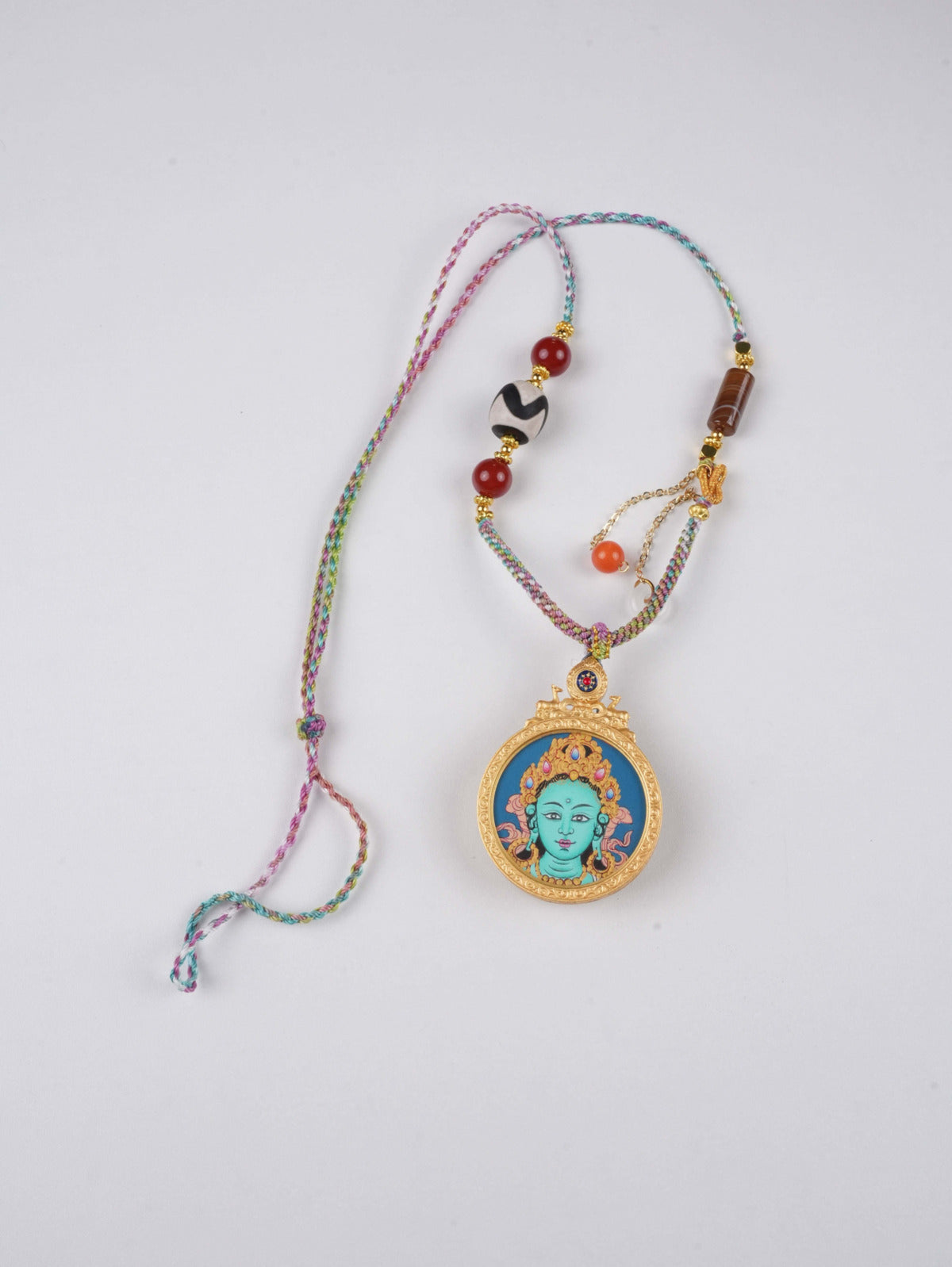 Sacred Green Tara round Gau box pendant, representing divine compassion and swift rescue.