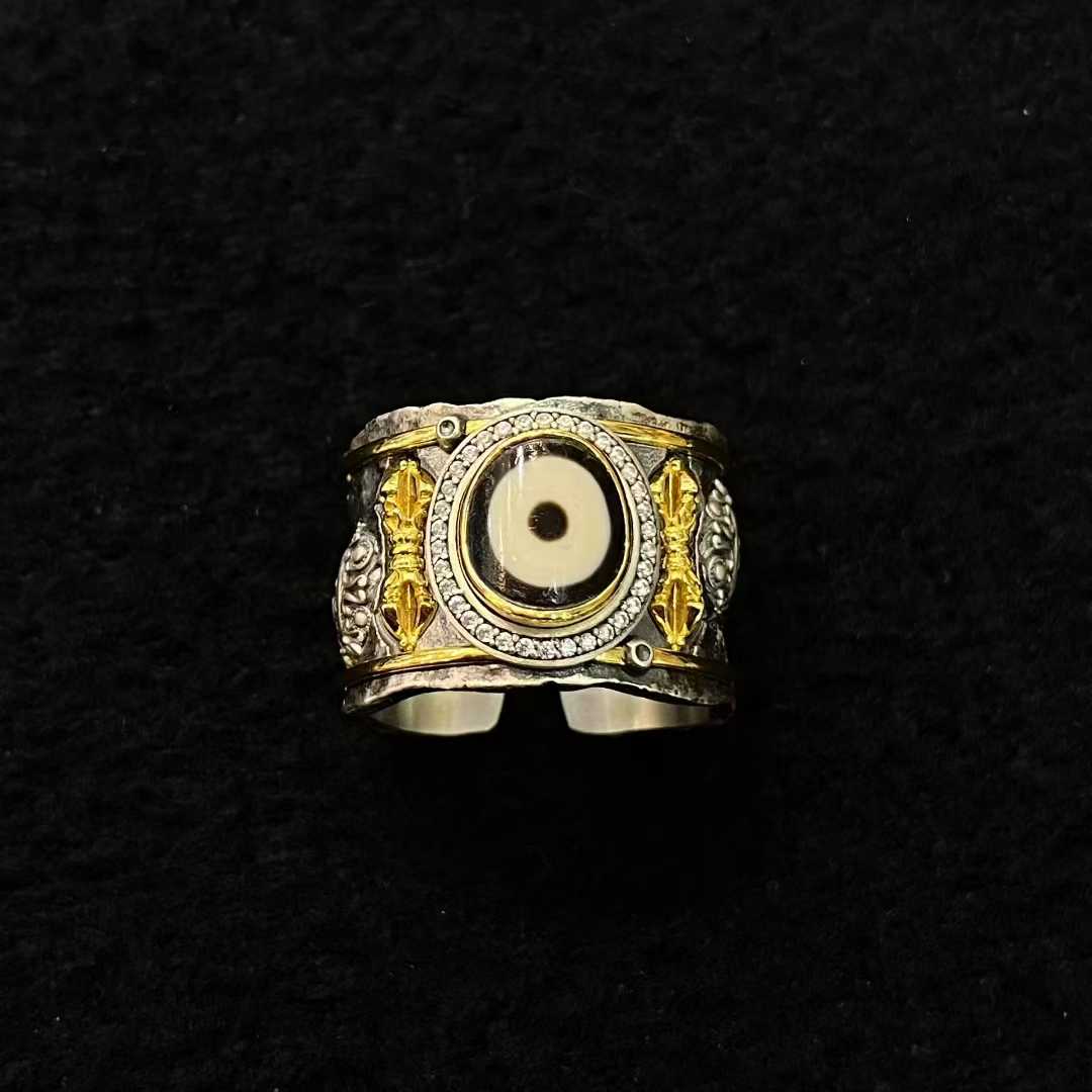 Tibetan Green Tara ring, crafted in gold with inlay, sacred symbol of compassion and protection.