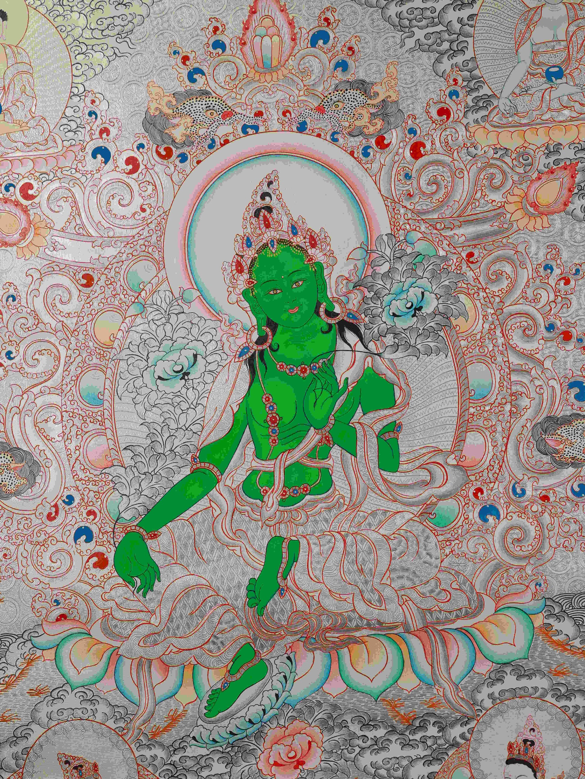 Handcrafted Tibetan Thangka of Green Tara with silver foil, ideal for meditation and sacred spaces.