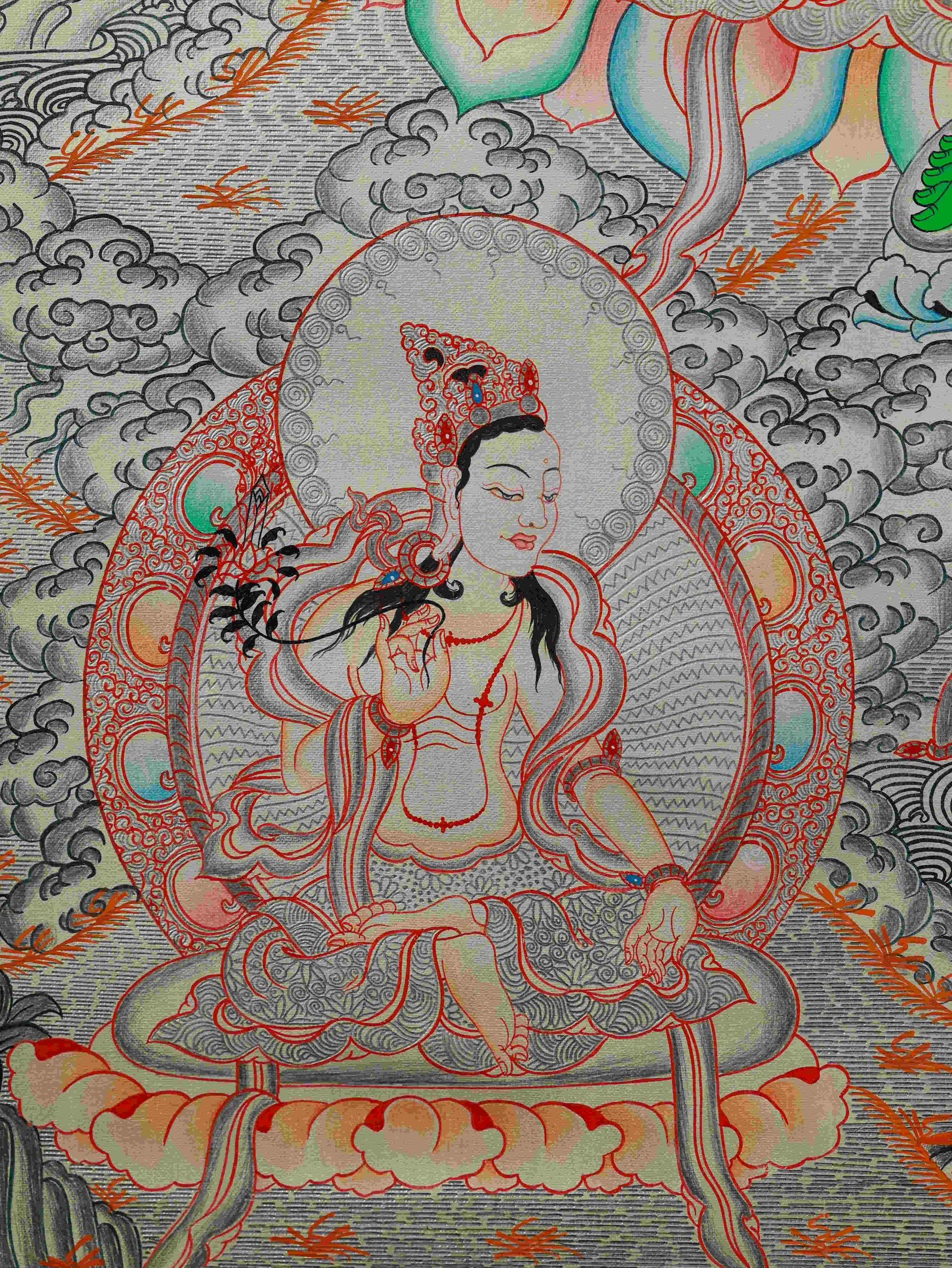 Exquisite Green Tara Thangka with silver foil highlights, promoting compassion and spiritual awakening.