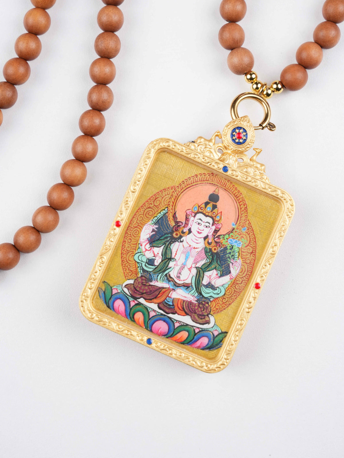 The Medicine Buddha (Bhaishajyaguru) in a classic Tibetan Thangka painting. This authentic artwork on traditional canvas is used for healing meditations and blessings.