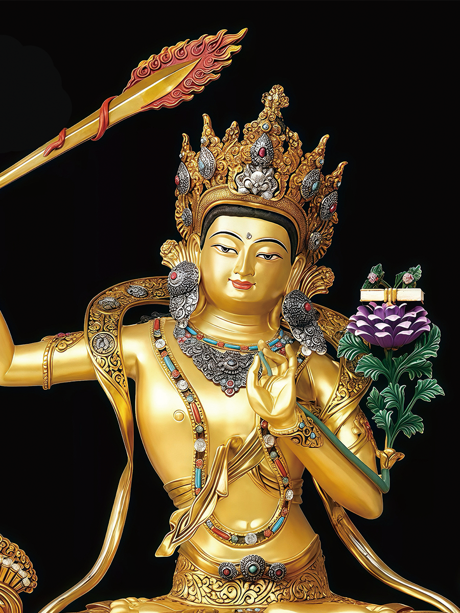 Detailed hand-painted gold finish on a Manjushri statue, representing premium Buddha Statue-Art for spiritual seekers.