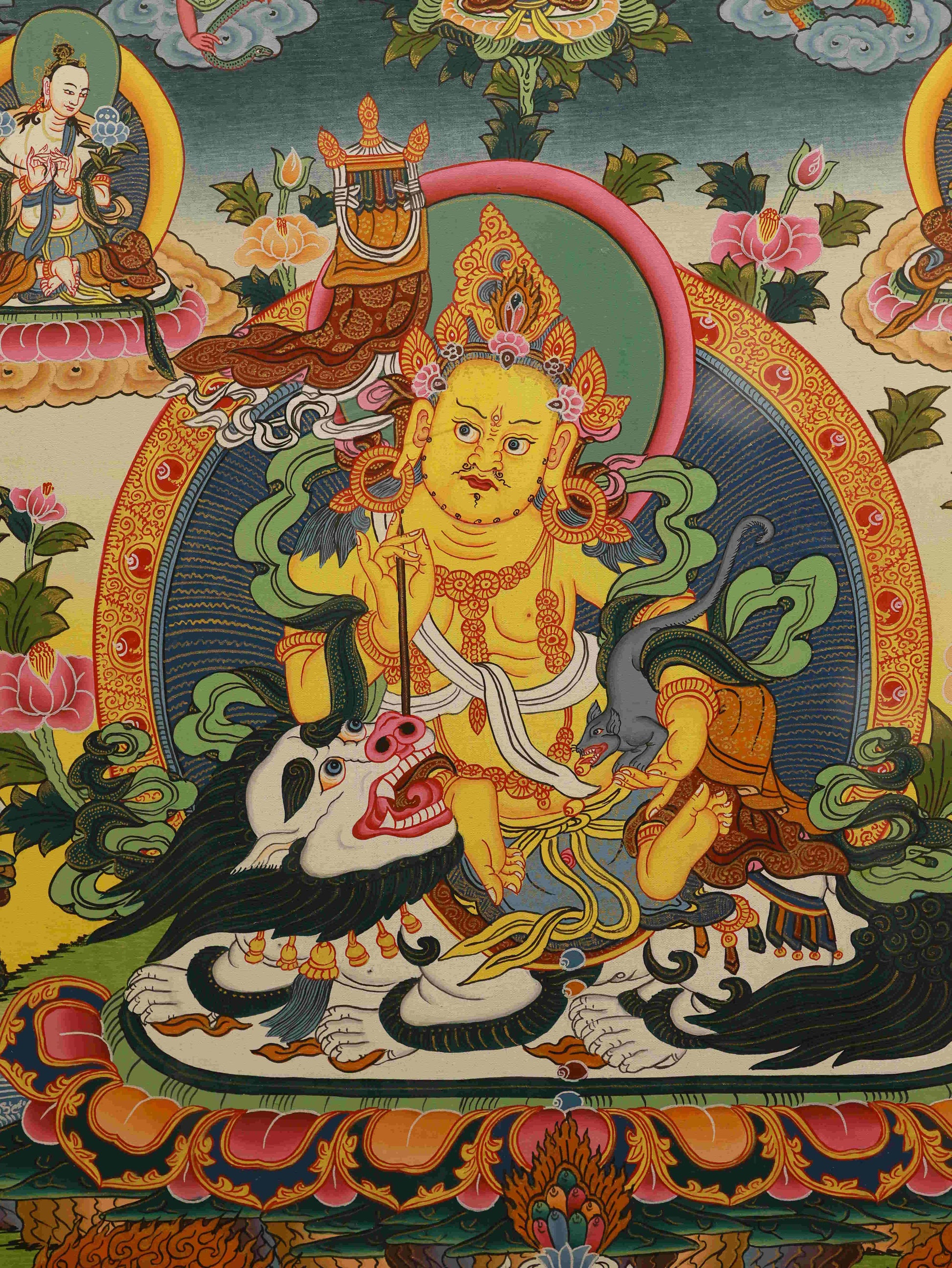 Tibetan Buddhist Yellow Jambhala Thangka symbolizing abundance, created with careful brushwork and vibrant mineral pigments.