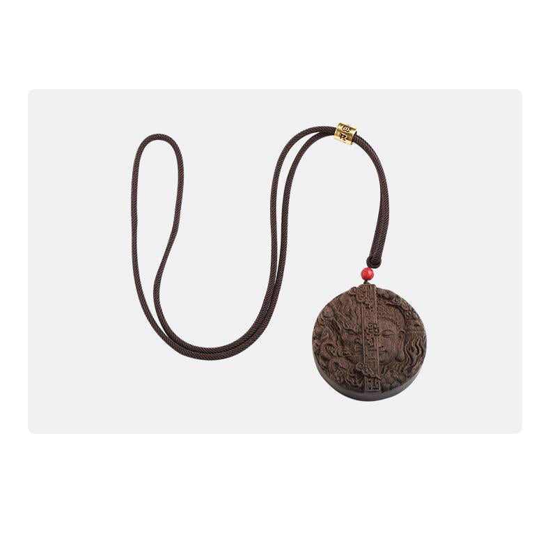 Tibetan Buddhist sandalwood and vermilion bead pendant, handcrafted for meditation and peace.