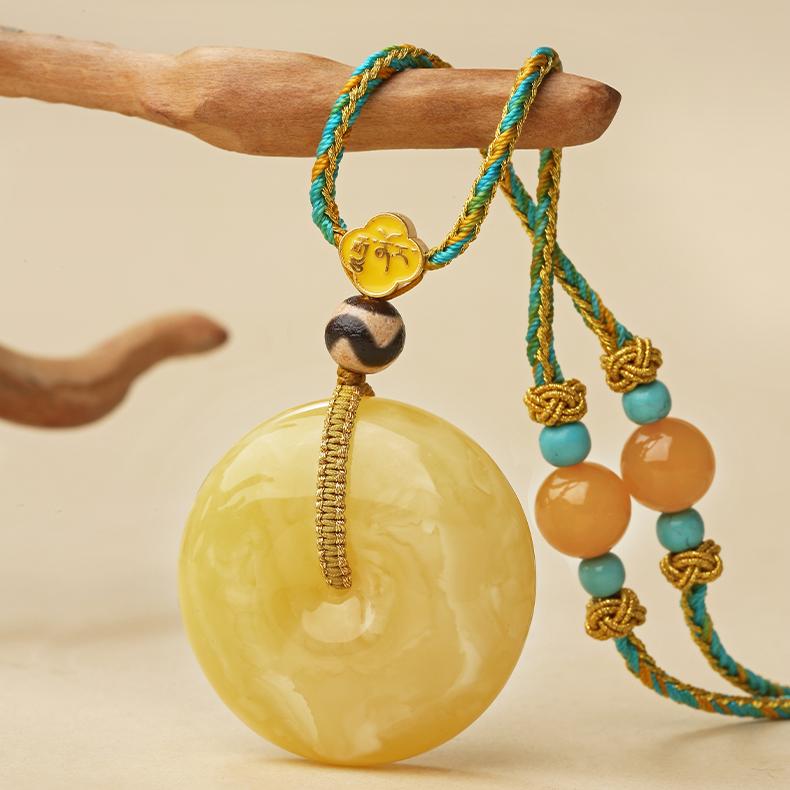 Tibetan Buddhist amber Ping An knot pendant with tiger tooth Dzi bead, handcrafted amulet for peace and protection