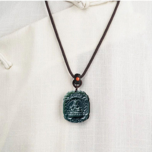 Luxurious handmade Hetian jade pendant for men, inspired by Tibetan spiritual jewelry art.