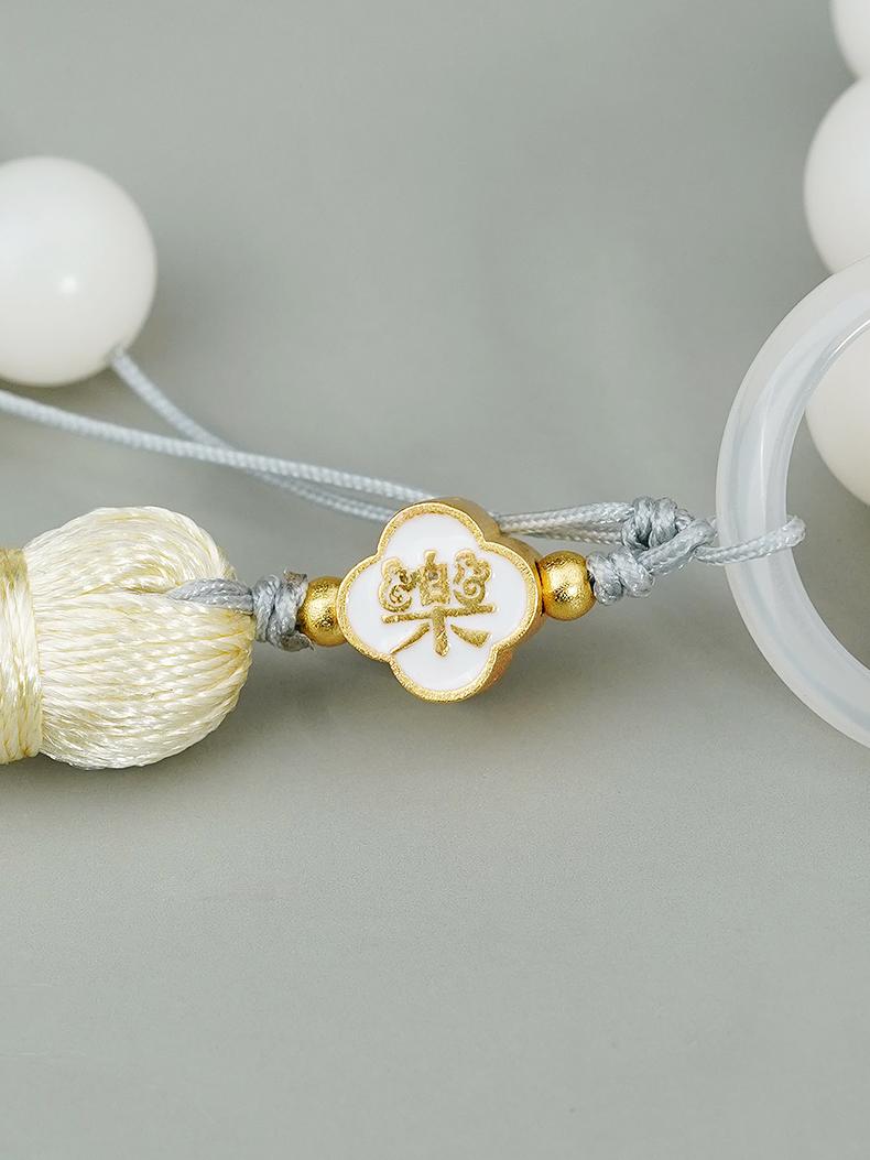 Handmade Bodhi handheld mala with silver details in Tibetan-Buddhist style