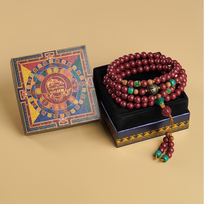 Tibetan-Buddhist 108-bead mala necklace with cinnabar, glass, sandalwood, and copper for mindfulness and spiritual focus