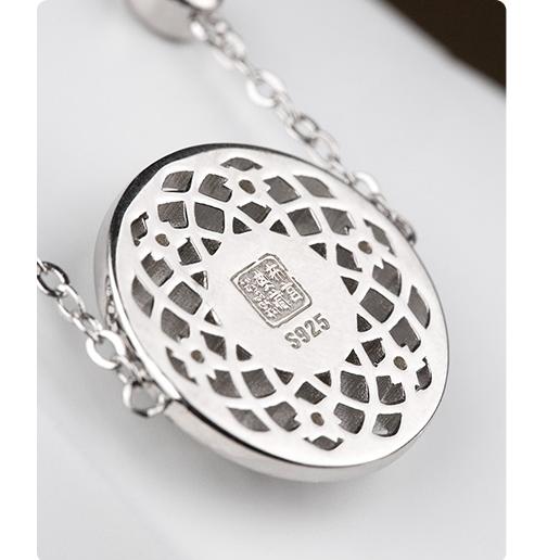 Zen-inspired handmade opal bracelet in silver, combining Tibetan spirituality and modern design.