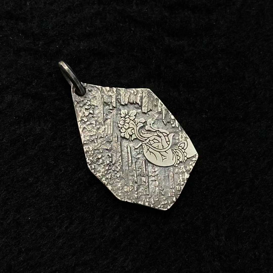 Tibetan Buddhist spiritual pendant of Green Tara in pure gold and silver, fully handcrafted.