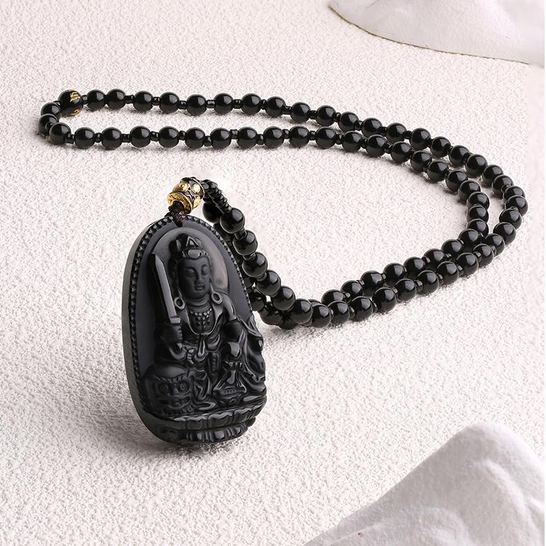 Handmade black obsidian necklace for men, combining spiritual style and protection.