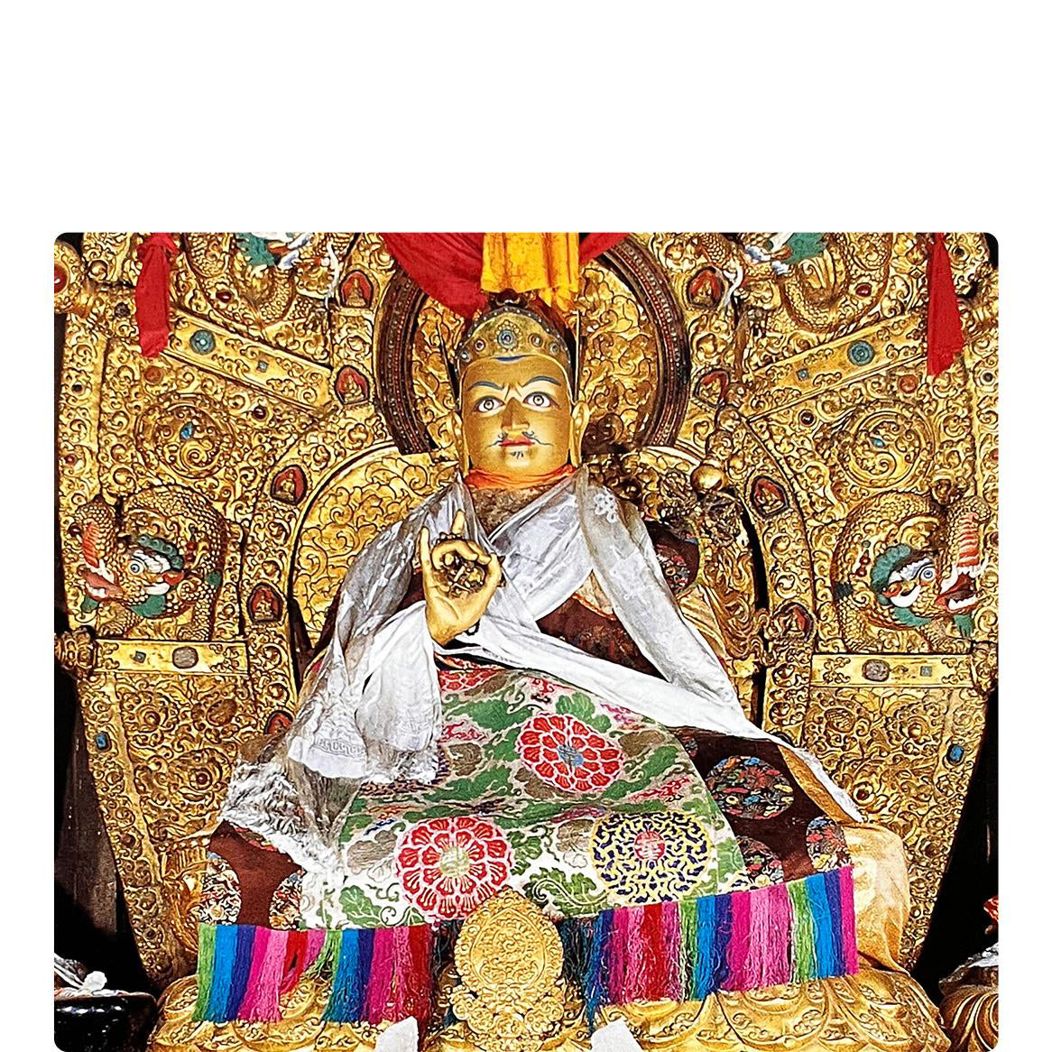 Gold-plated silver lotus pendant representing purity, rebirth, and compassion.