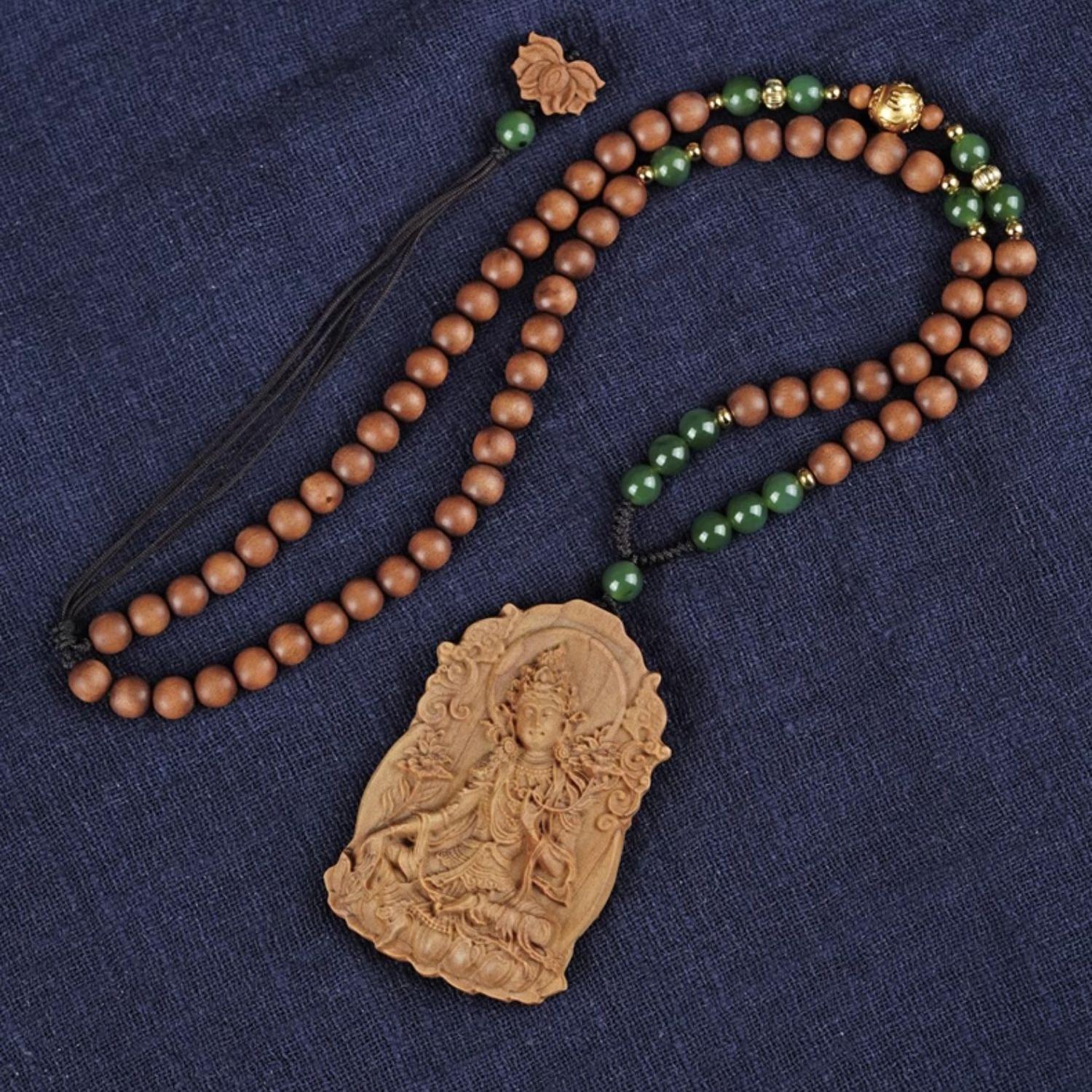 Tibetan Buddhist necklace with old sandalwood Green Tara carving, handmade for spiritual protection and compassion.