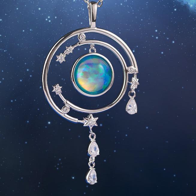 Tibetan Buddha art silver jewelry set — enamel earrings and opal bracelet for mindful living.