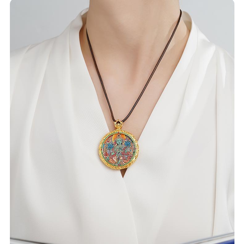 Handcrafted Thangka amulet pendant representing spiritual harmony and wisdom.
