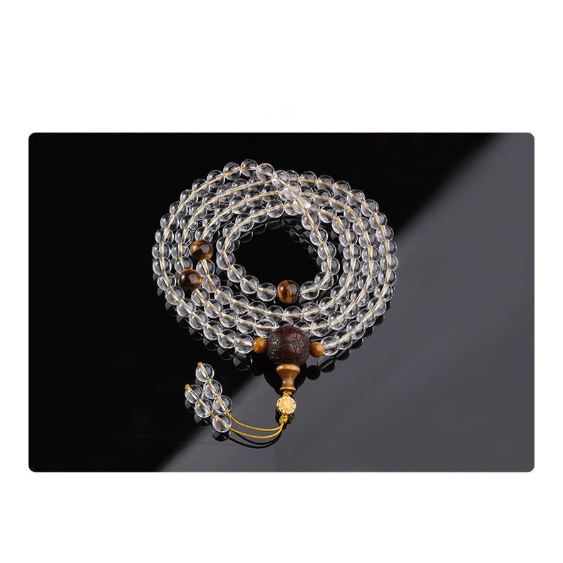 Handcrafted Tibetan Buddhist mala with white crystal, tiger eye stones, and 925 silver accents.